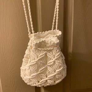 White bag with lace detail